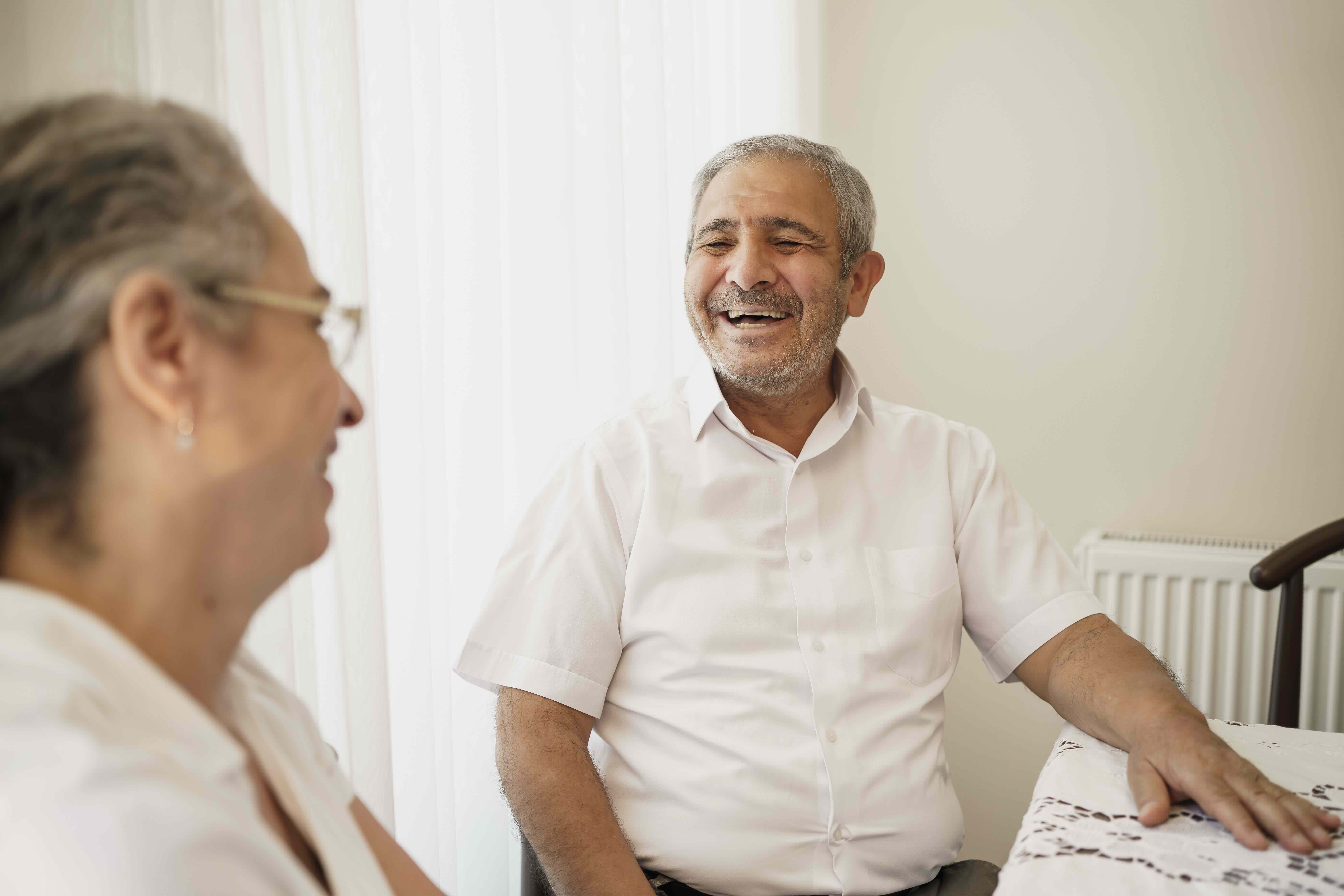 Healthcare professional in conversation with patient